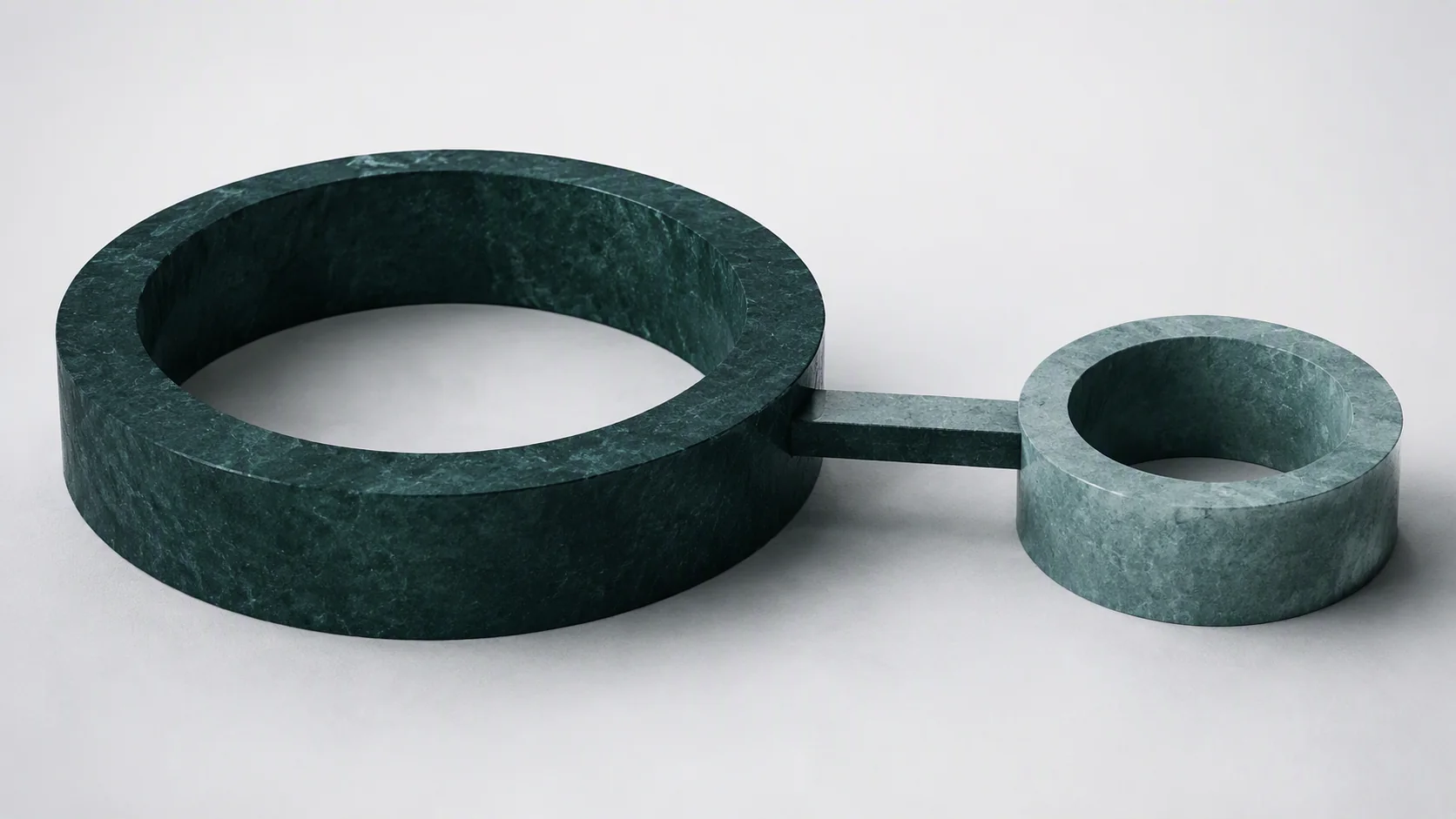 A refined abstract deep-green structure connects to one smaller teal form across a narrow illuminated threshold.